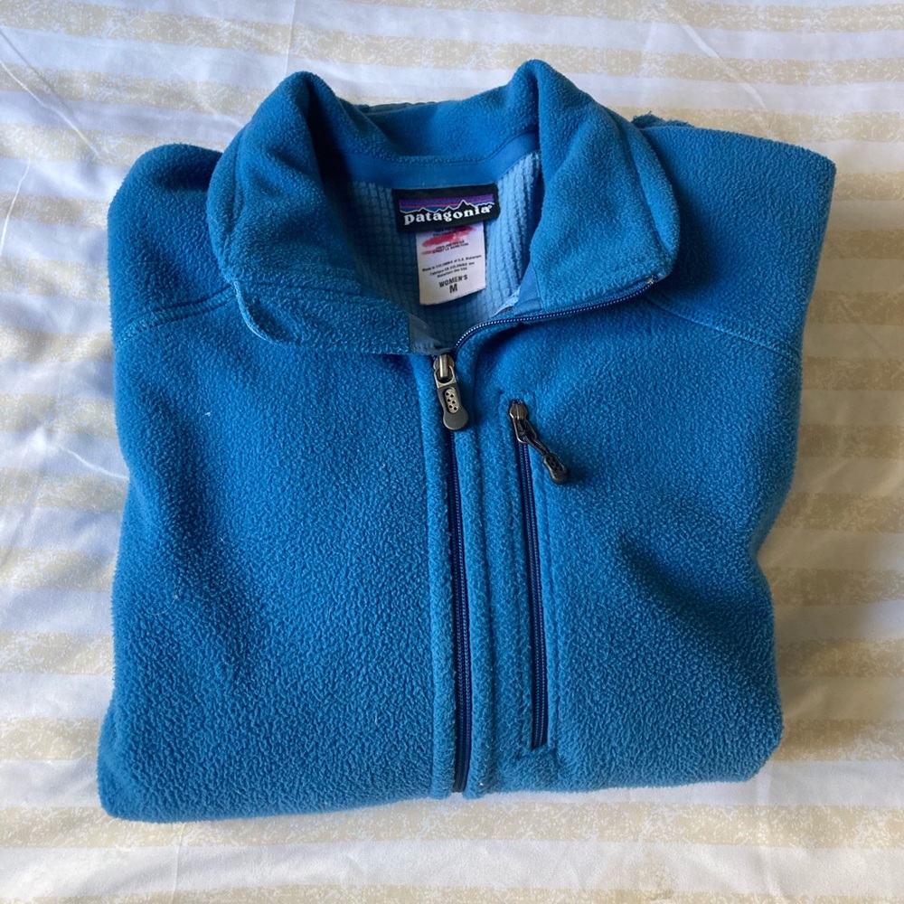 Patagonia blue zip up sweater- size M